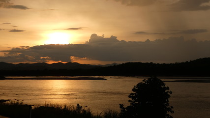 Sunset in Laos on the Mekong river