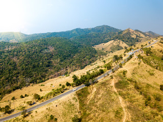 Fototapeta na wymiar the aerial above landscape of a dry mountain. And the forest that has been destroyed becomes agriculture, farmland In the countryside of Thailand.