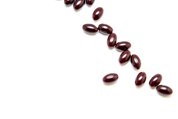 Chocolates in chocolate glaze isolated on white