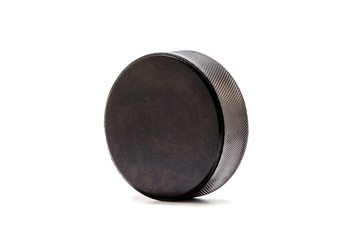 Hockey puck isolated on white