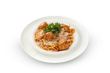  Spaghetti with meatballs, parmesan and tomato sauce on a plate. Tasty Italian pasta food. Top view shot above isolated on white background.