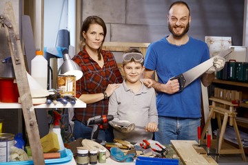 Portrait of tinkering family