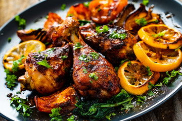 Barbecue chicken drumsticks with roast vegetables