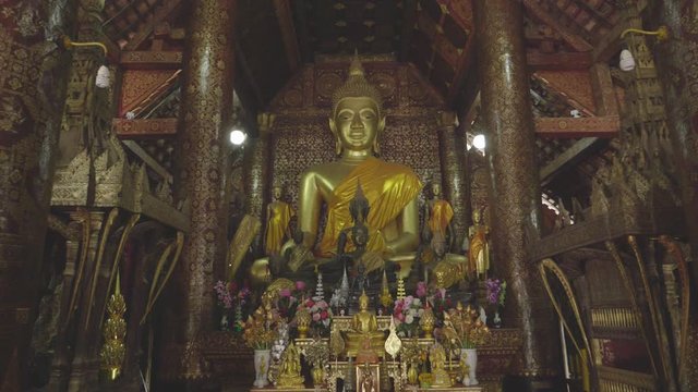 Buddha Statue In Wat Xieng Thong Landmark In Luang Prabang, Slow Motion