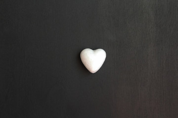 Obraz premium Heart isolated on black background for text