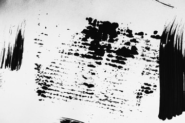 Black paint burlap patterns on a white background