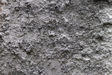 Concrete texture gray-boloy colors. Harsh texture for design and decorations. Natural building material. Natural patterns on the stone. Plates for floor and walls