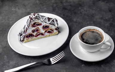 coffee and cake winter cherry in a white plate with copy space for your text. breakfast concept