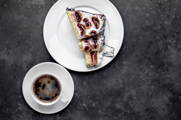 coffee and cake winter cherry in a white plate with copy space for your text. breakfast concept
