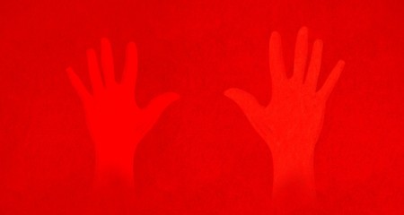 red hands on red backgriund 