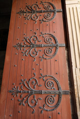  Decorated hinges in the door of Saint Trophime Cathedral in Arles, France. Bouches-du-Rhone, France