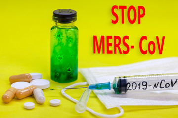 Concept of coronavirus quarantine. MERS-Cov (middle East respiratory syndrome coronavirus), Novel coronavirus (2019-nCoV), test tube with coronovirus in a chemical laboratory, on a yellow background