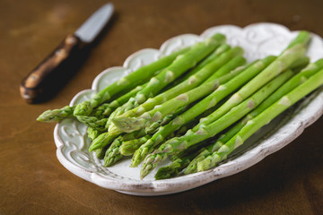 Fresh asparagus on a wooden table