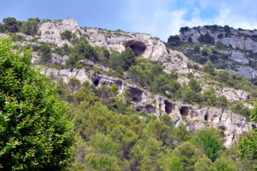 Caves in the mountain at Fontaine de Vaucluse, a commune within the département of Vaucluse and the région of Provence-Alpes-Côte d'Azur in France