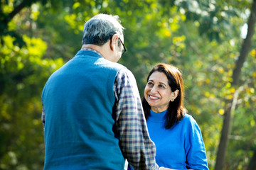 Laughing senior couple spending leisure time