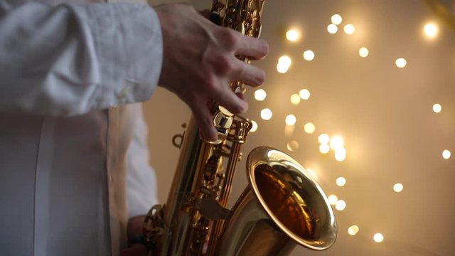 A close-up of a saxophone musician.