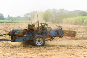 Sugarcane leaf compress by tractor