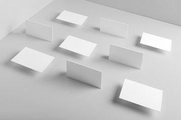 Real photo, business card collage mockup template, isolated on light grey background to place your design. 