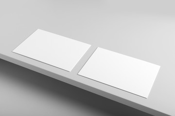 Real photo, business card mockup template, front and back, isolated on light grey background to place your design. 