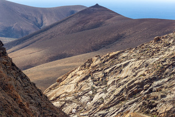 Panoramic view at landscape between Betancuria and Pajara  on Fuerteventura with multi colored...
