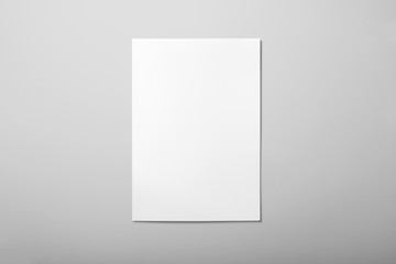 Real photo blank portrait A4, US-Letter, brochure magazine mockup isolated on gray background.