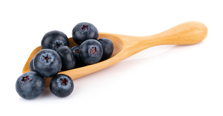 closeup fresh blueberry in spoon on white background