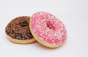 Delicious donuts on light background.