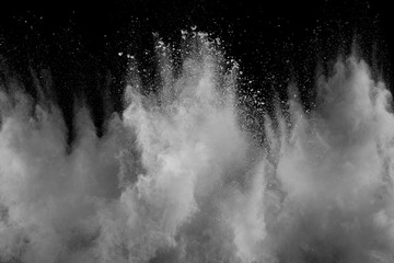 Explosion of white dust on black background. - 318298836
