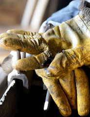close-up shot of old and dirty worker gloves