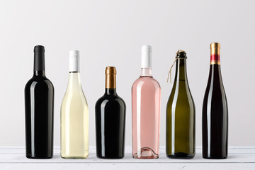 Wine bottles mockup isolated on white background, with blank labels to place your design