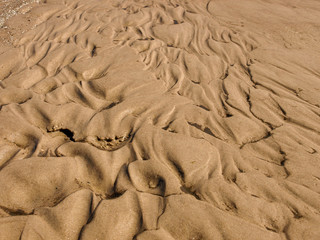 beautiful sand texture of wind, water and sand