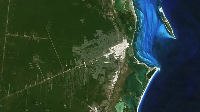 City growth timelapse aerial view of Cancun Mexico tourist destination on caribbean sea. Satellite images furnished by Nasa