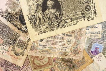 Background of different vintage banknotes of Russia of different denominations close-up