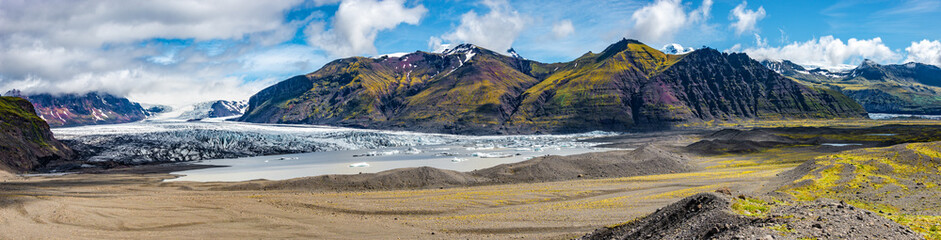 Panoramic view over Skaftafellsjokull glacier and tourists, a wander near Skaftafell on South...