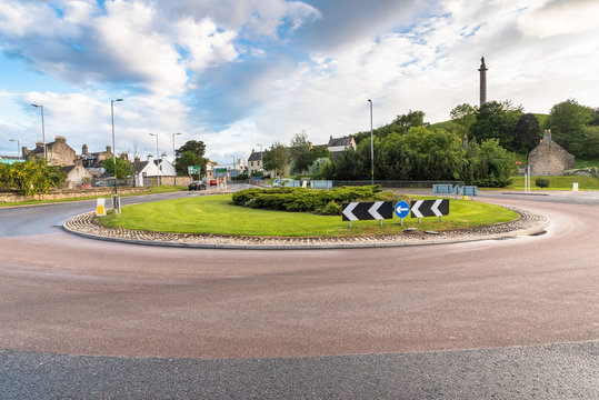 Roundabout in a urban setting on a cloudy spring day