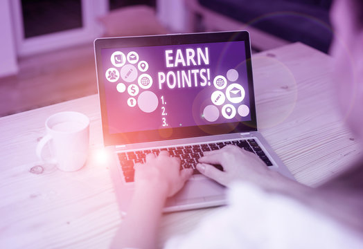 Writing note showing Earn Points. Business concept for collecting scores in order qualify to win big prize