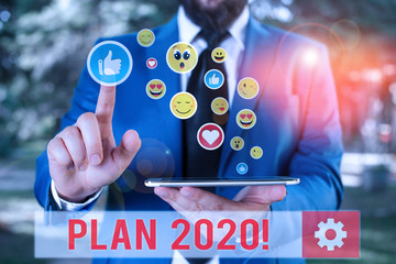 Conceptual hand writing showing Plan 2020. Concept meaning detailed proposal doing achieving...