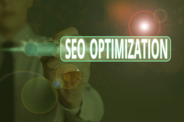 Writing note showing Seo Optimization. Business concept for increasing visibility of a website or a...