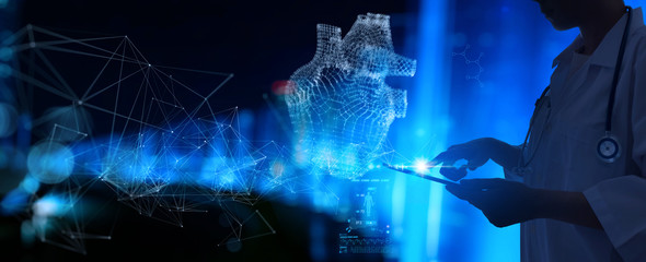 Medical technology diagnostics of heart concept.Medicine doctor and stethoscope working with Ui heart and diagnostics analysis medical treatment.