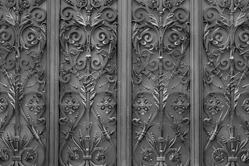 Detail of a wrought iron decoration on an entrance door