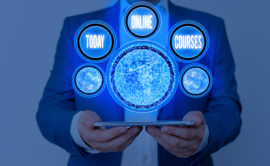 Writing note showing Online Courses. Business concept for courses deliver a series of lessons to a...