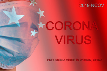 The phrase Corona virus on a banner with blurred Chinese flag on the background.