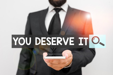 Writing note showing You Deserve It. Business concept for Reward for something well done Deserve...
