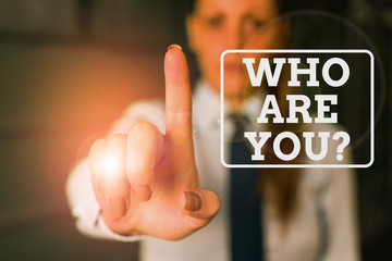 Conceptual hand writing showing Who Are You question. Concept meaning Identify yourself description...