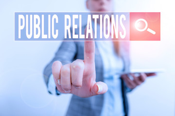 Text sign showing Public Relations. Business photo showcasing state of the relationship between the public and a company Digital business concept with business woman