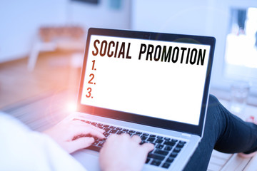 Conceptual hand writing showing Social Promotion. Concept meaning advancing students to the next...