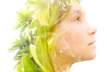 Double exposure portrait of a young girl
