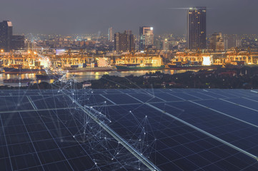 Smart Logistic port and renewable concept.solar panels linkage to  the city need power. Green...