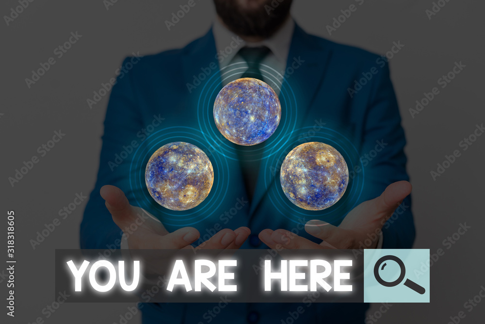 Poster writing note showing you are here. business concept for this is your location reference point global