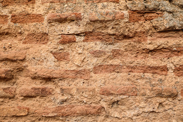Texture of old brick and mud wall